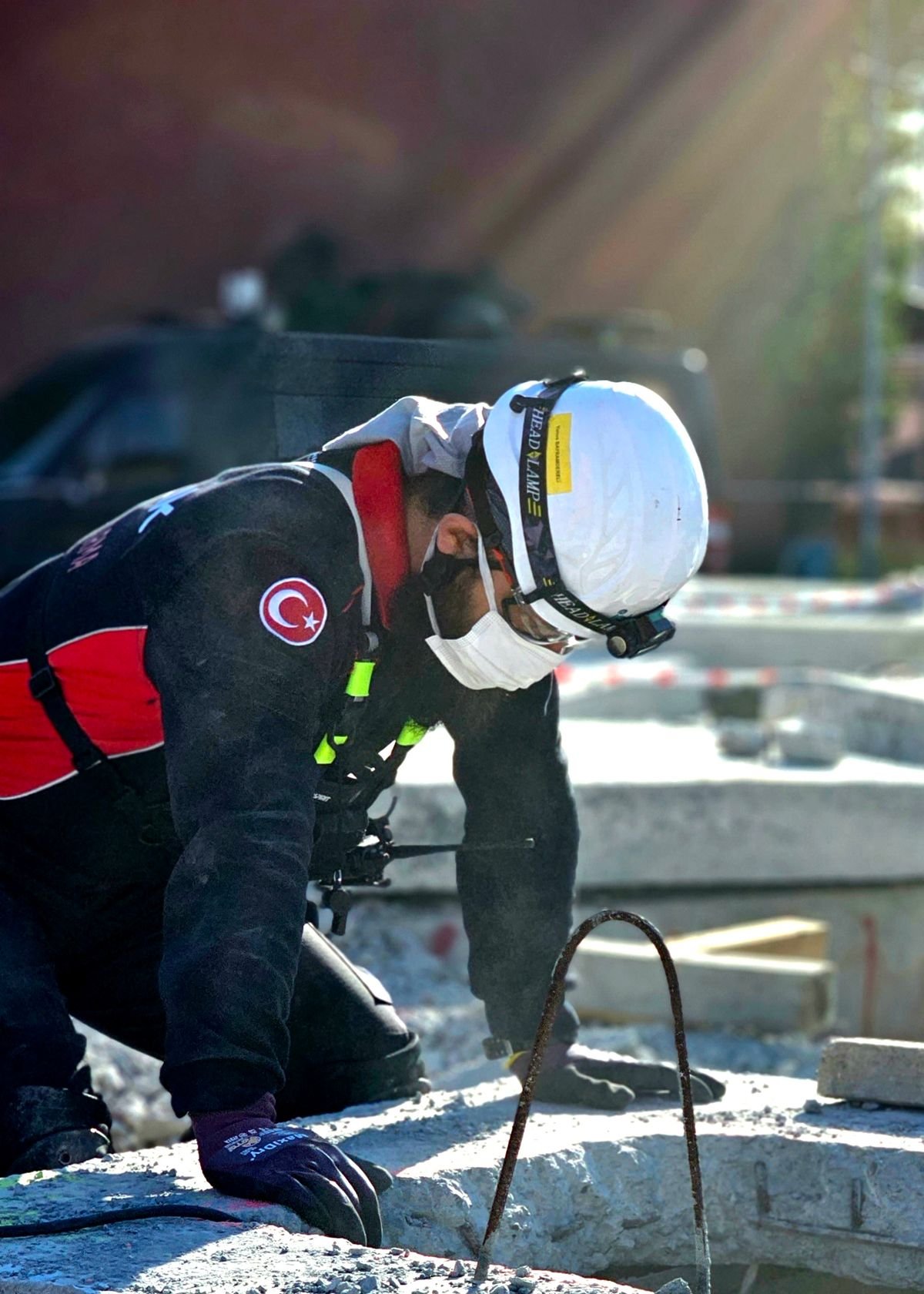 Worker wearing safety equipment at a construction site